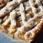 Delicious homemade Apple Slab Pie with golden crust and spiced apple filling.