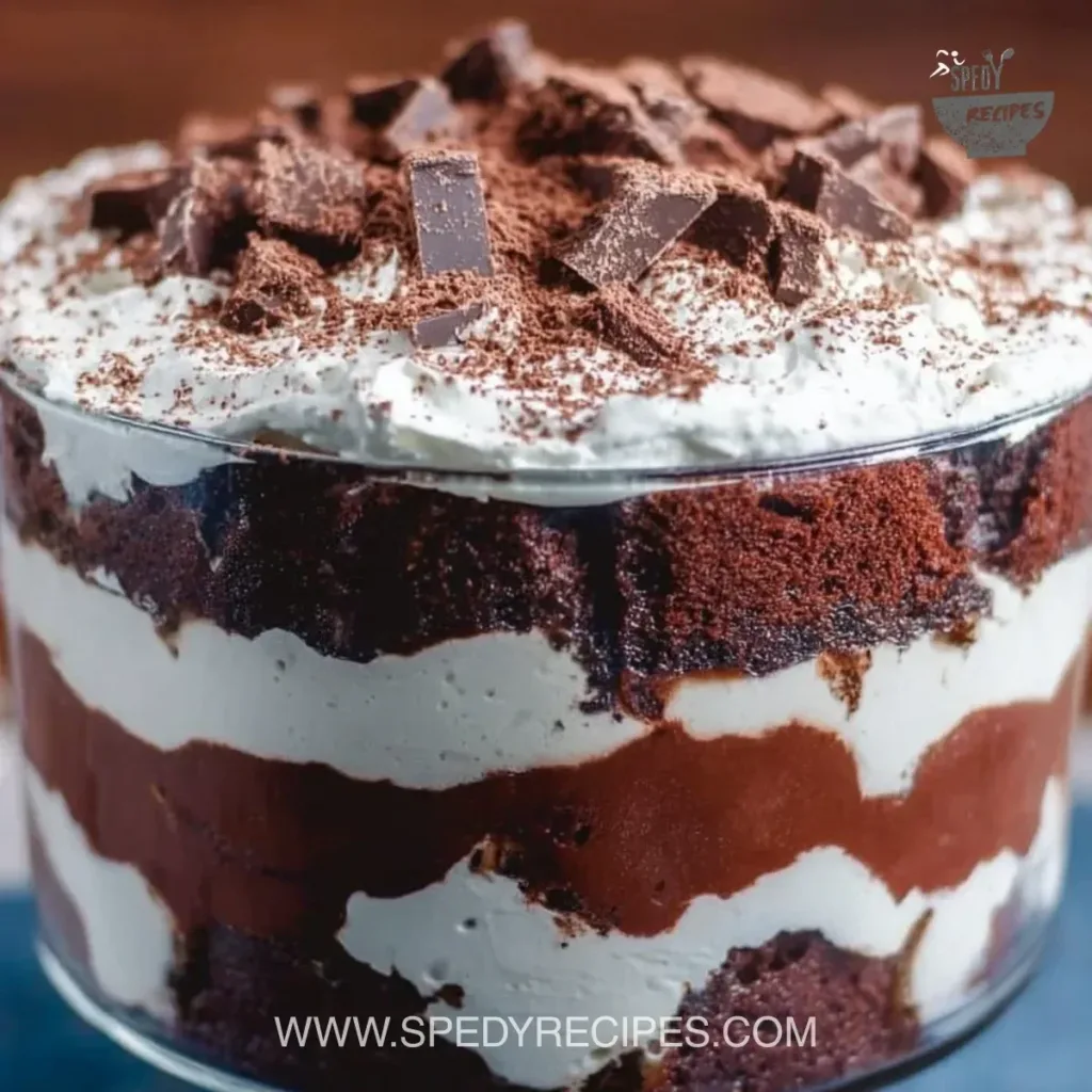 Delicious Brownie Trifle layered with chocolate brownie and creamy filling.