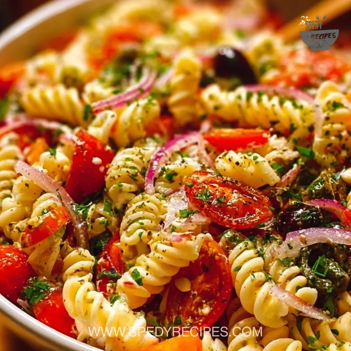 Colorful and fresh legendary pasta salad with vegetables and dressing