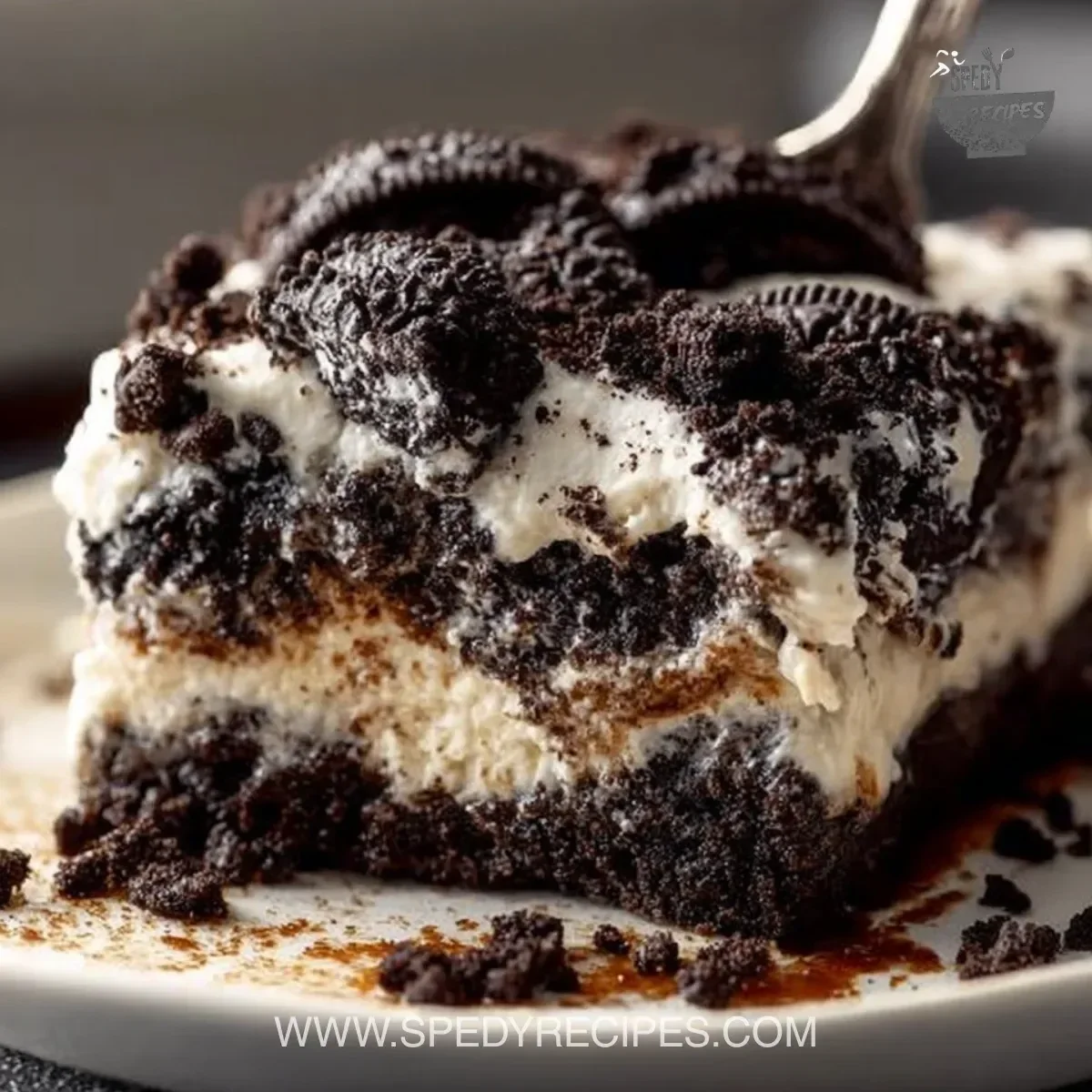 Delicious Oreo Dump Cake with creamy layers and crushed Oreos on top