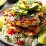 Delicious Honey Lime Chicken served with avocado rice stack