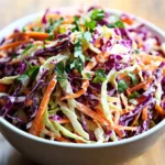 Bold flavor-packed coleslaw with vibrant ingredients and dressing