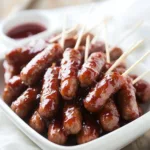 Crockpot Little Smokies served in a bowl with sauce