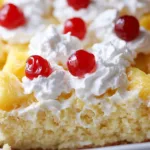 Easy Easter Pineapple Heaven Cake topped with fresh pineapple and whipped cream