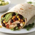 High Protein Chicken Crunch Wrap Supreme filled with grilled chicken and fresh veggies.
