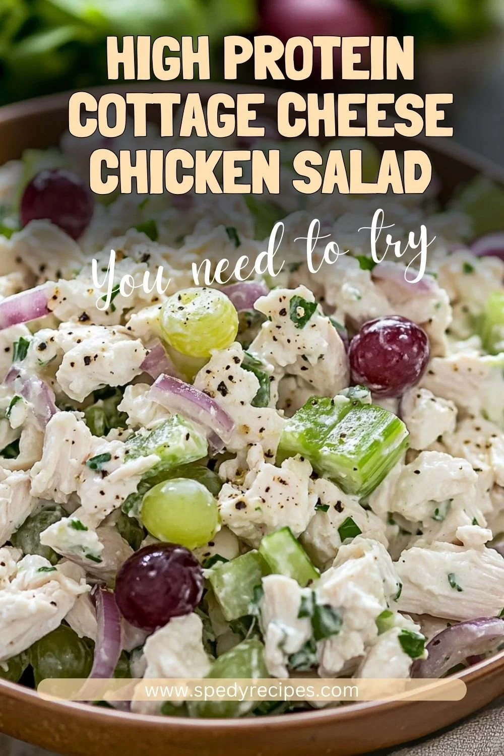 High protein cottage cheese chicken salad in a bowl topped with fresh herbs