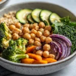 Delicious roasted veggie chickpea bowls with maple dijon tahini dressing