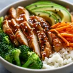 30-Minute Teriyaki Chicken Bowl ready to serve with fresh vegetables and rice.