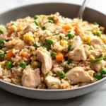 Delicious Chicken Fried Rice with vegetables and chicken on a plate
