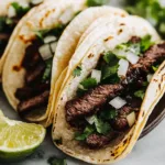 Delicious grilled beef Mexican street tacos with fresh toppings and vibrant colors