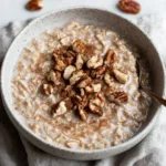 Maple Brown Sugar Overnight Oats in a jar with fresh toppings