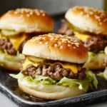 Mini Big Mac cheeseburgers with layers of beef and special sauce