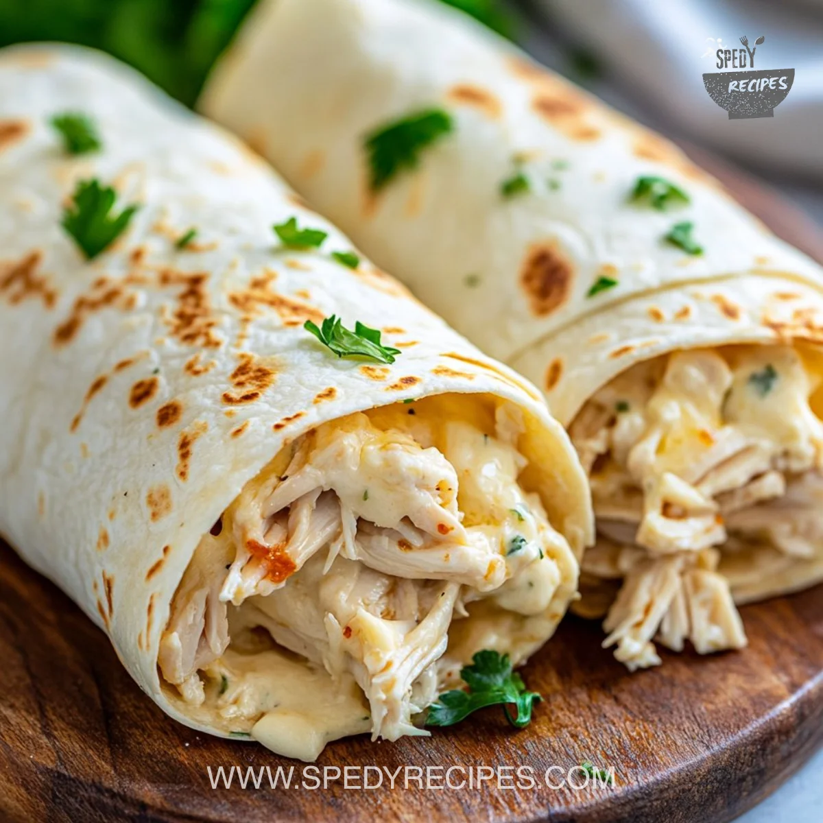 Ooey-Gooey Cheesy Garlic Chicken Wraps