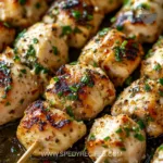 Delicious Garlic Parmesan Chicken Skewers on a grill plate