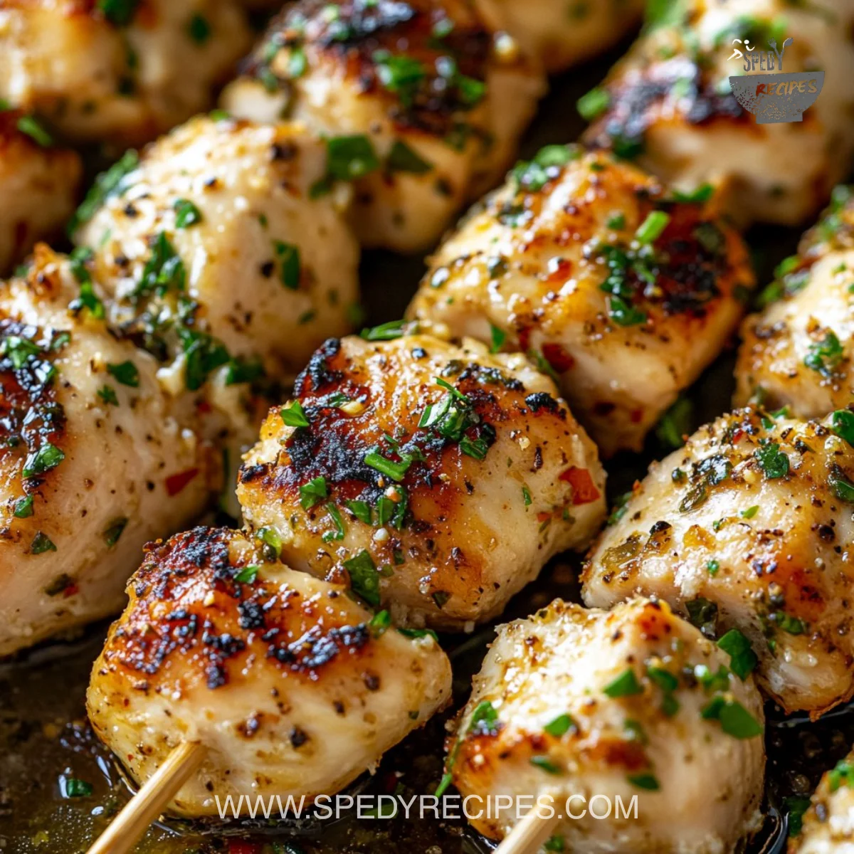 Delicious Garlic Parmesan Chicken Skewers on a grill plate