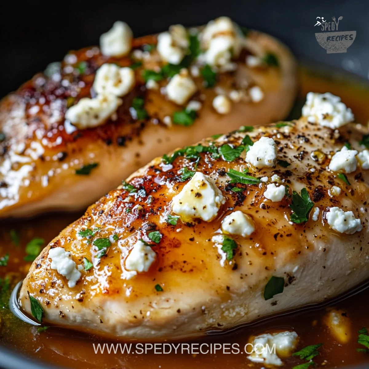Hot Honey Feta Chicken with a sweet and spicy glaze served on a plate