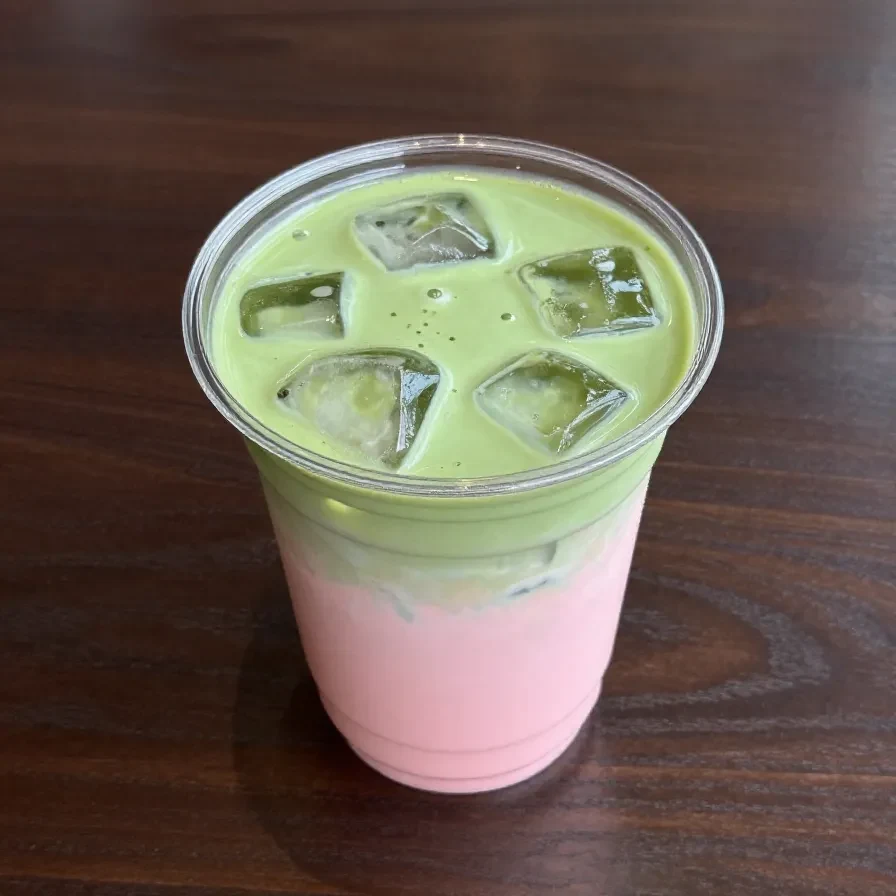 A TikTok-inspired Starbucks Matcha Pink Drink in a clear cup with ice.